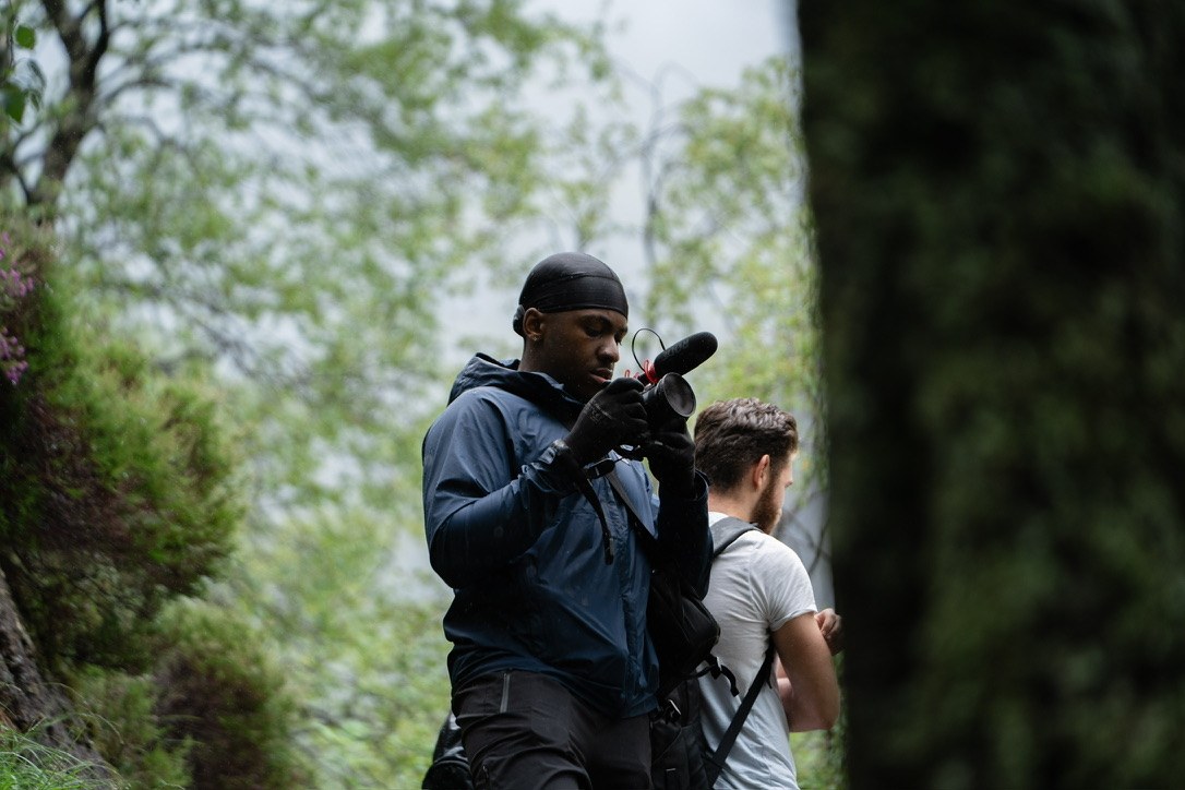 Efua on location shooting handheld on the Sony FX30